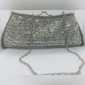 Frangi: Elegant Silver Clutch with Chain Strap